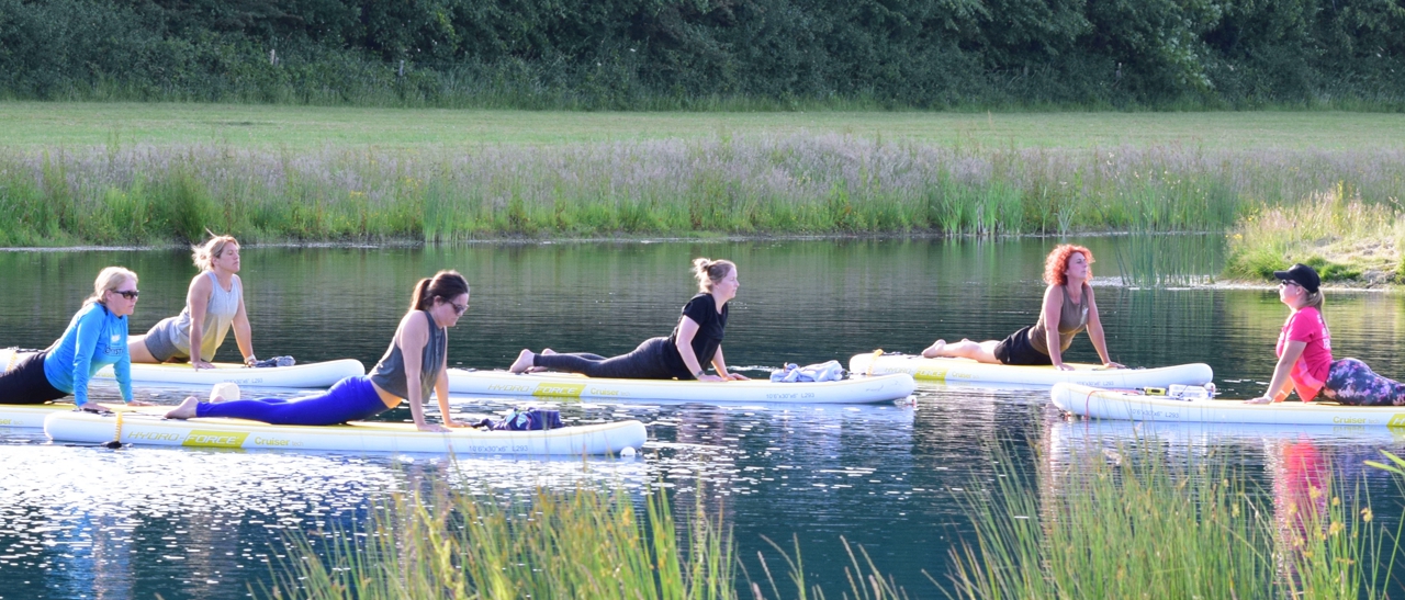 SUP Yoga at Crystal Lake View Therapies Lincoln